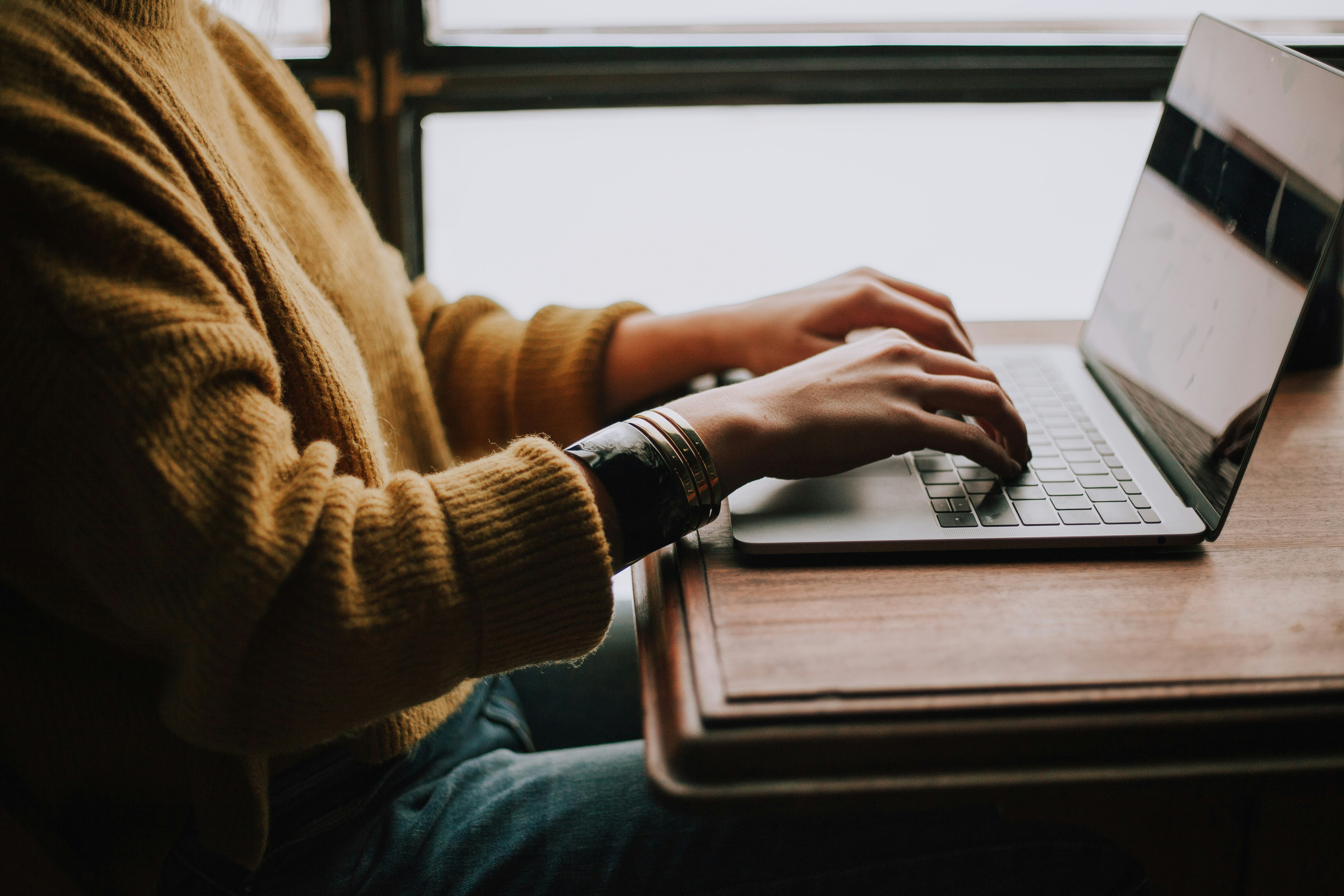A man reading emails