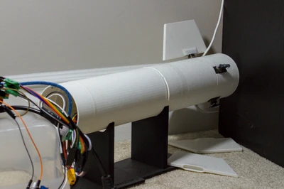 Photo of the Dragonfly V0 guided model rocket's booster