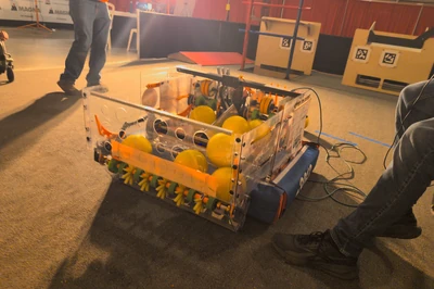 Photo of FRC Team 2013's 2026 season robot on a test field
